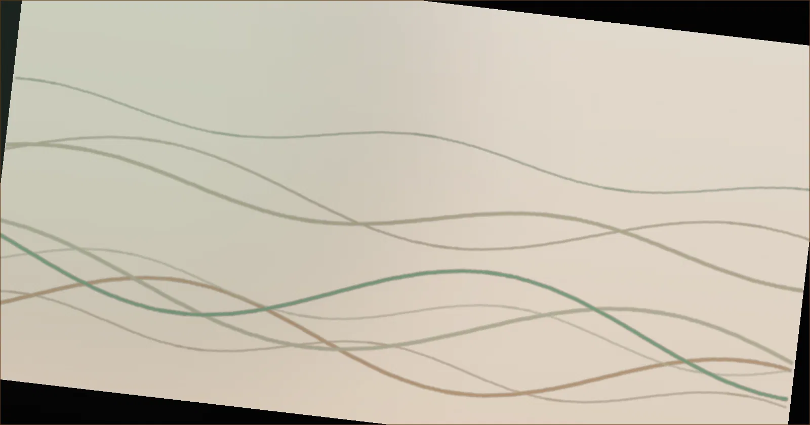 A gel plate with a rolled layer of acrylic paint and a leaf being lifted beside a finished print